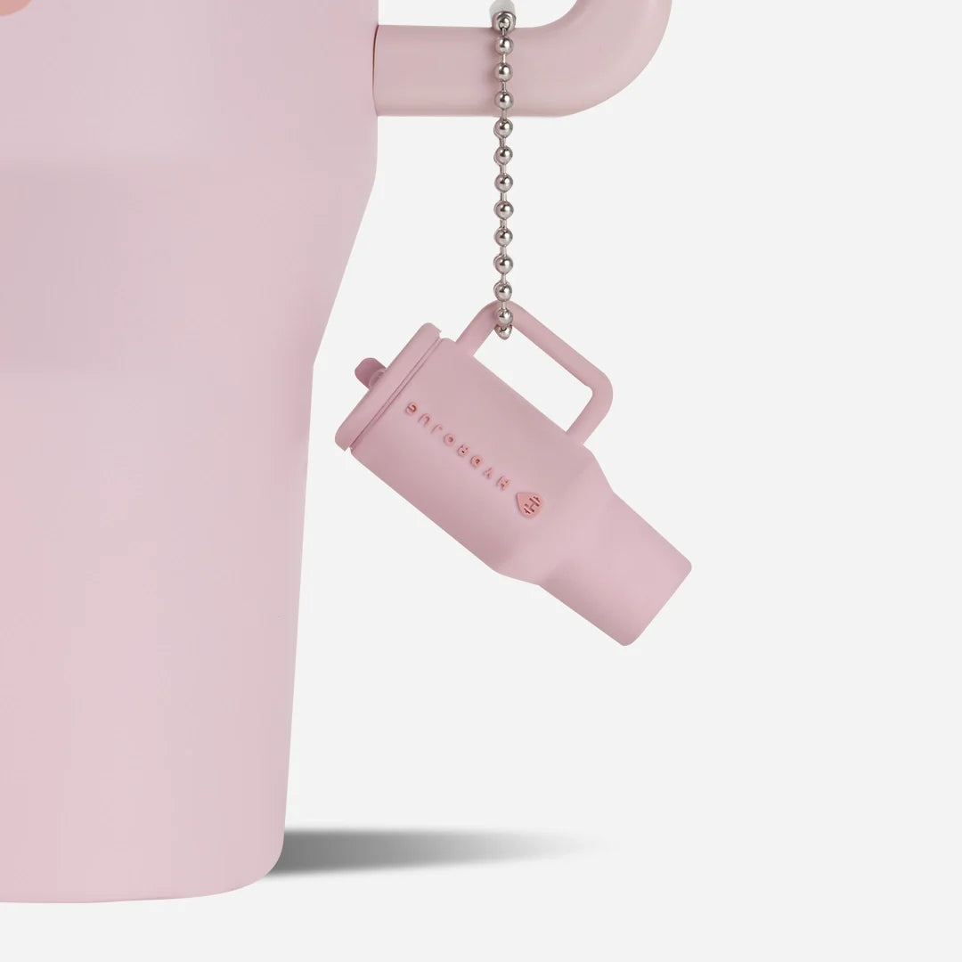 traveler-keychain-u1 Web-TravelerKeychainPhotos-PinkSand2.webp